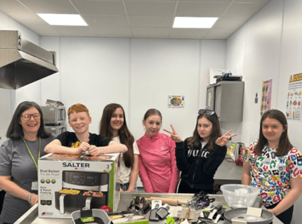 Young People enjoying new kitchen equipment on Open Access session.