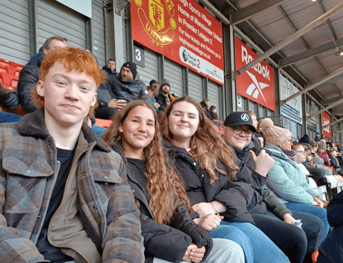 Young People Enjoying Match Day Experience at Leigh Sports Village